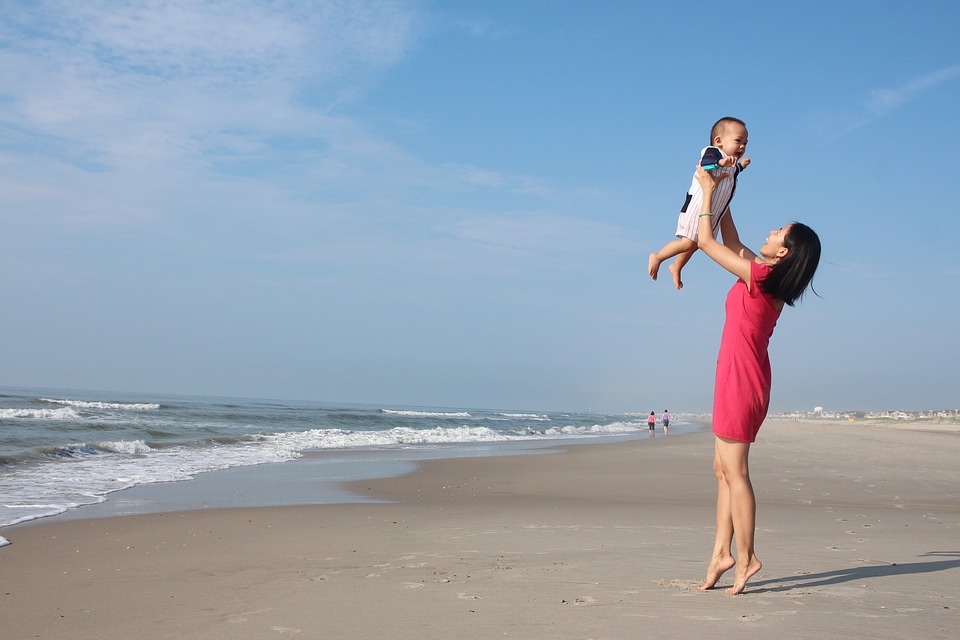 mother and kid on the beach