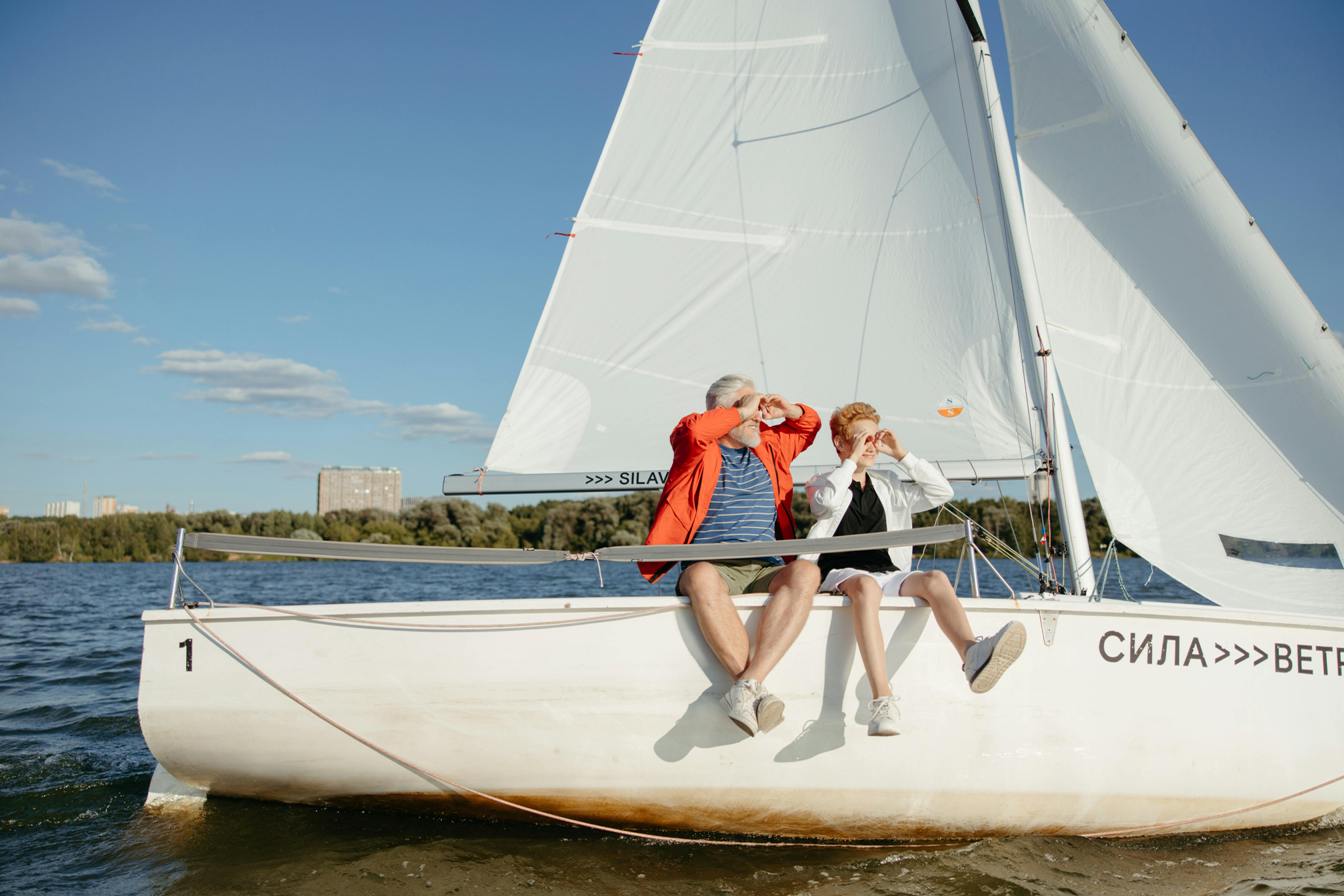 man and son on a sailboat